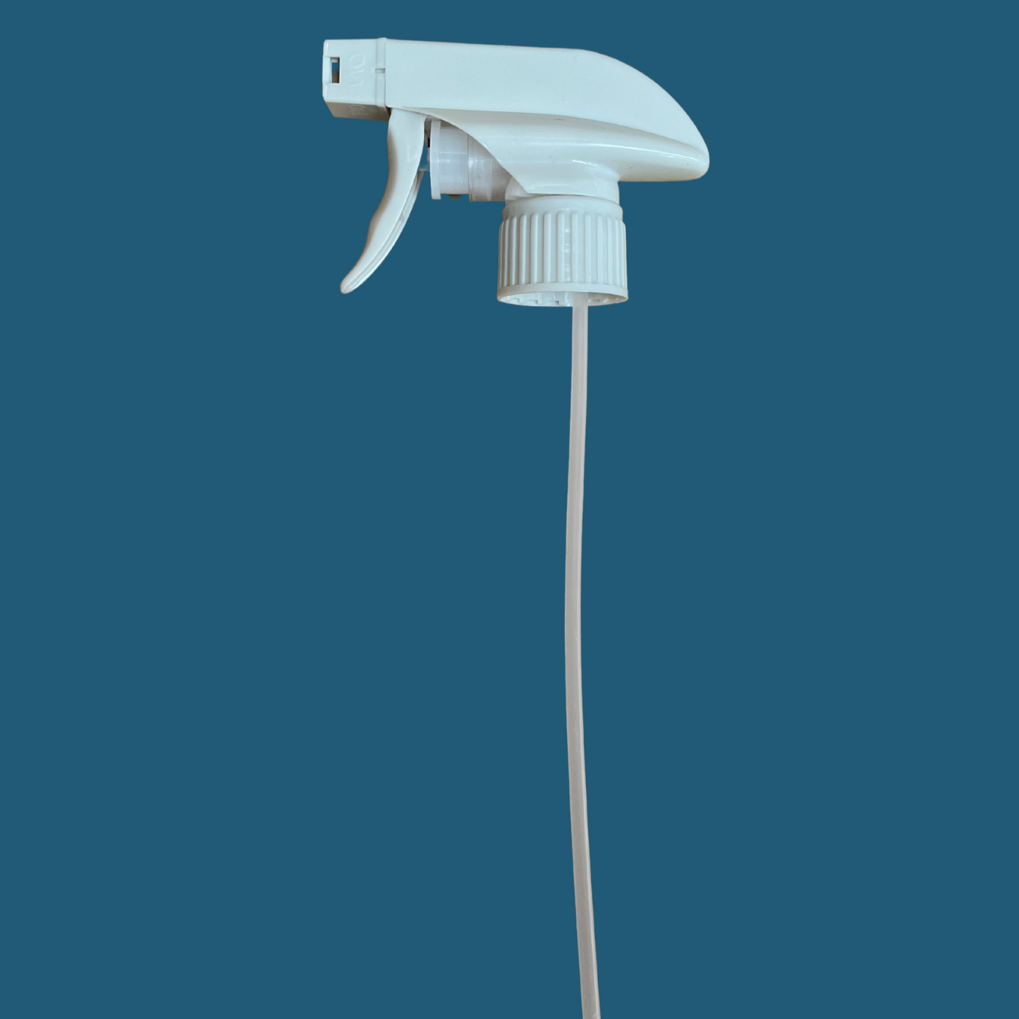White spray nozzle on a blue background