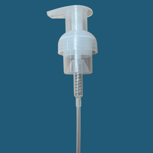 Foaming hand wash pump head against a blue background