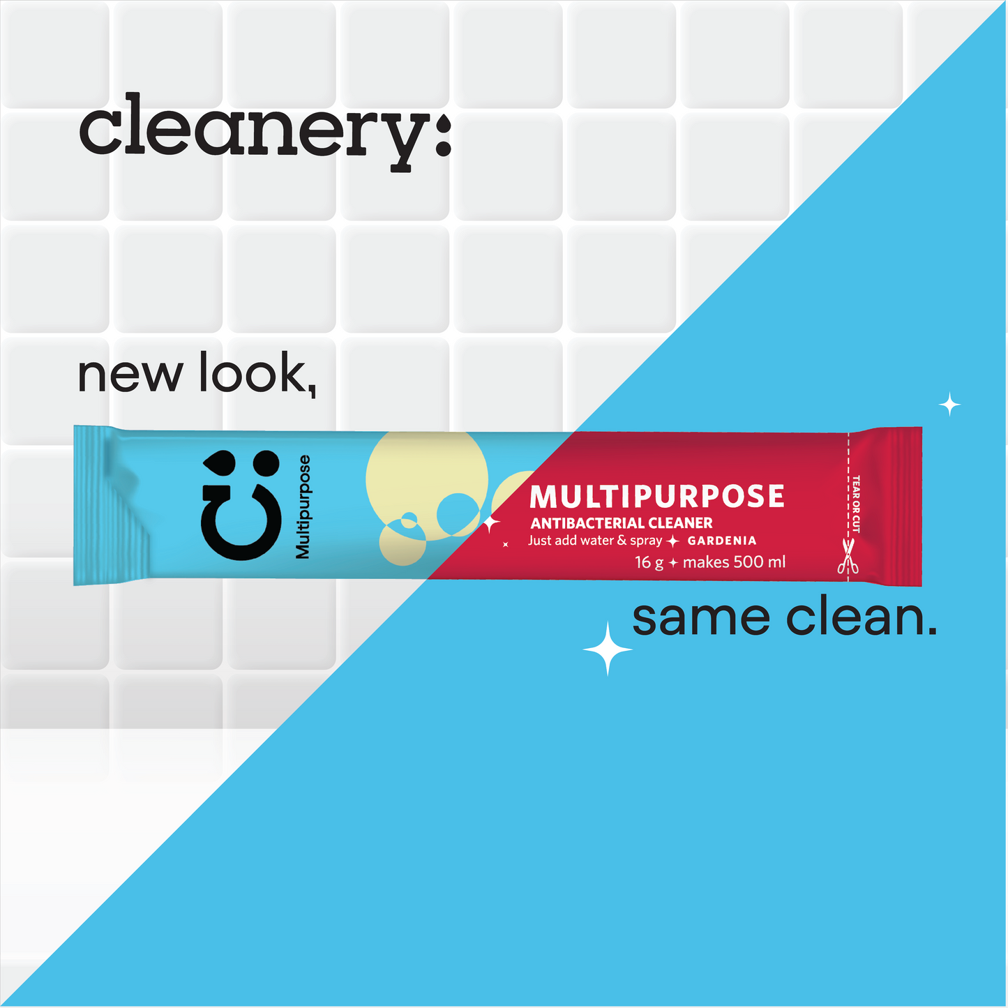 A single multipurpose antibacterial cleaner stick package from Cleanery is shown horizontally across a diagonal blue divider on a white tiled background. The package is light blue on the left with a black logo and a pale yellow circular graphic, and red on the right with white text reading 'MULTIPURPOSE ANTIBACTERIAL CLEANER'.
